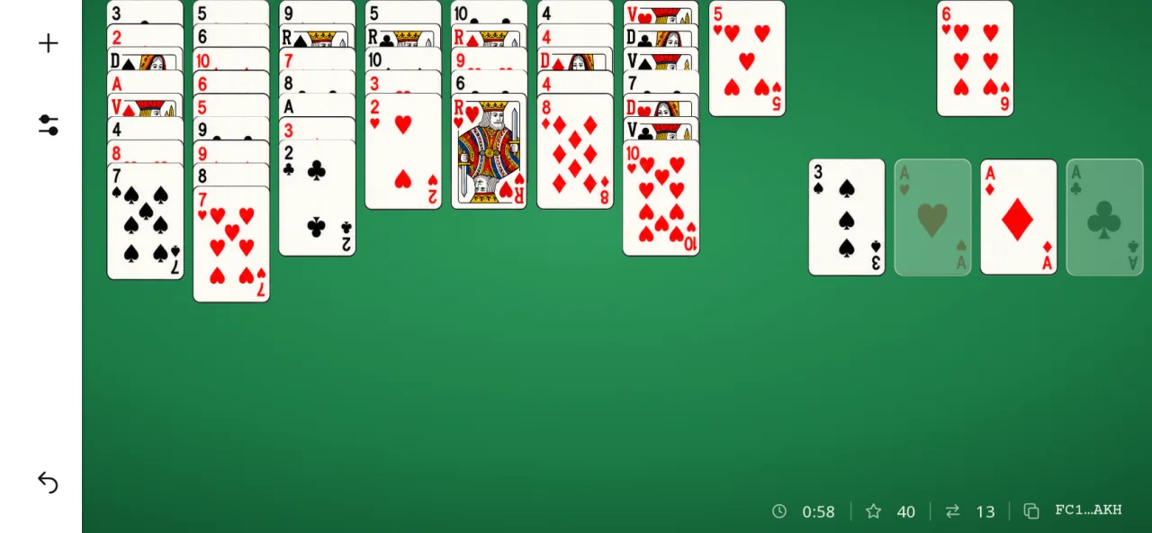 Plateau de FreeCell Solitaire joué avec une seule cellule : il ne reste qu’une case de cellule, occupée par le 6 de cœur, au-dessus des fondations.